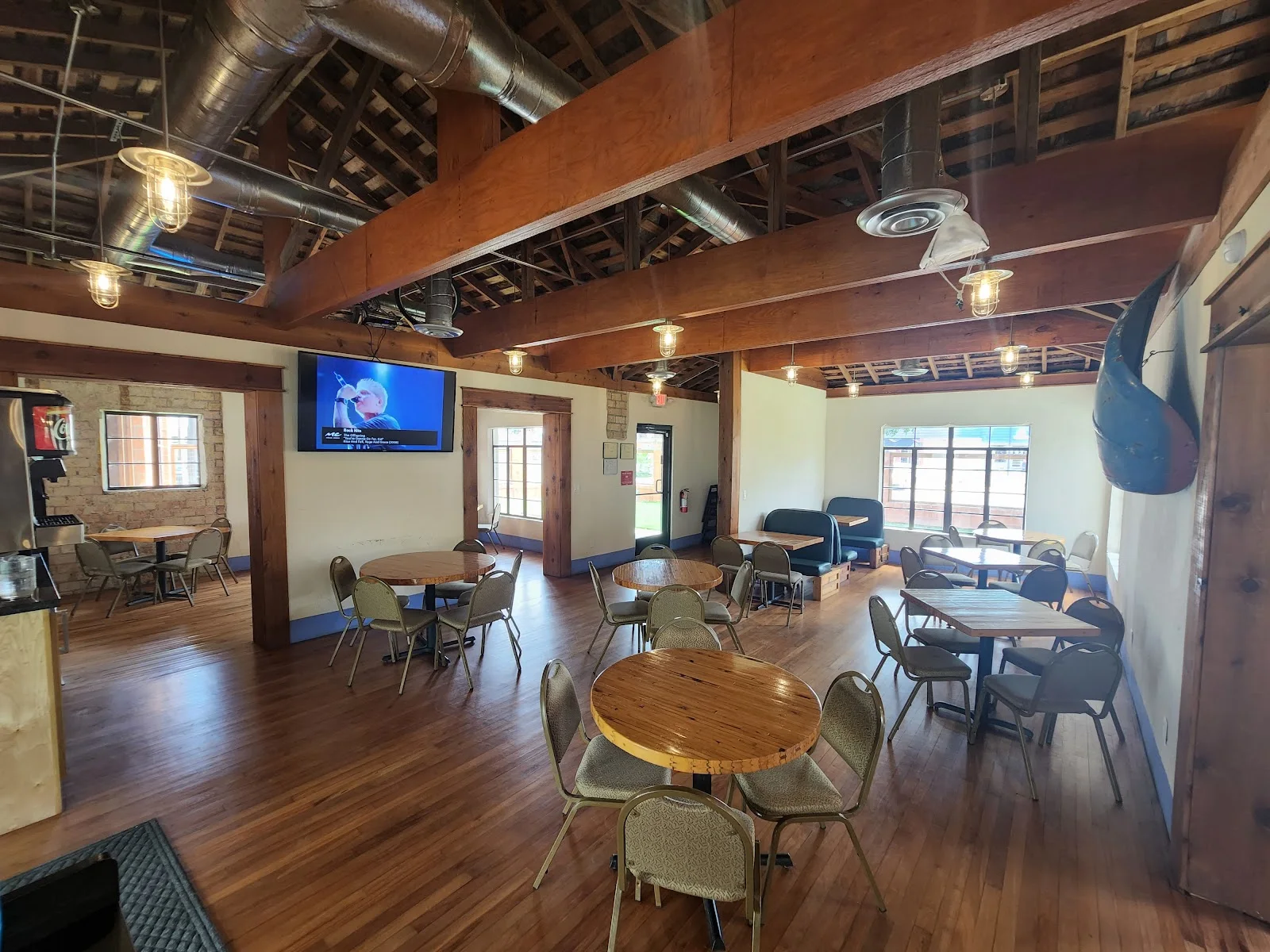 The warm wood dining room inside Uncle Chops Food Court